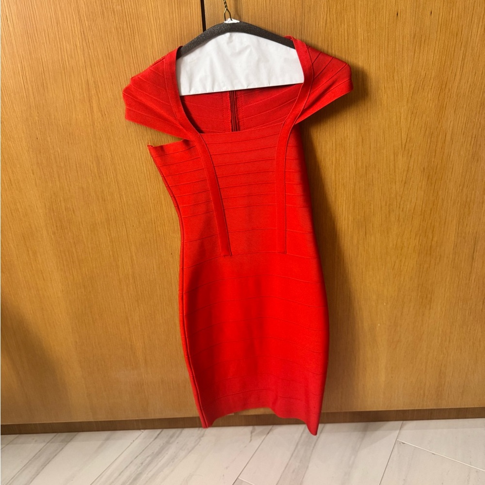 Herve inspired. Bright red. Fits likes a glove, bandage dress.
